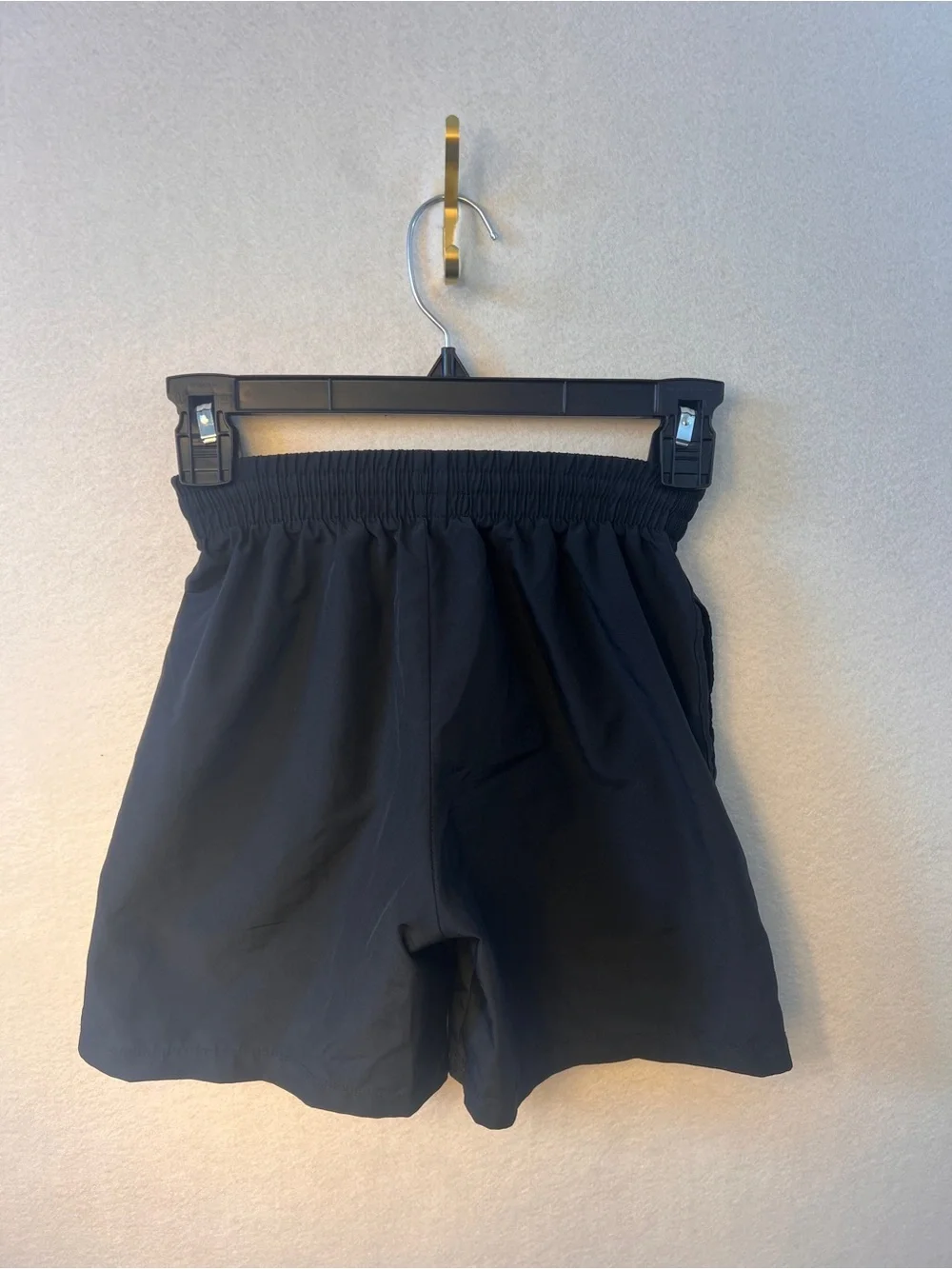 Nike Men's Black Athletic Shorts with White Swoosh Accent